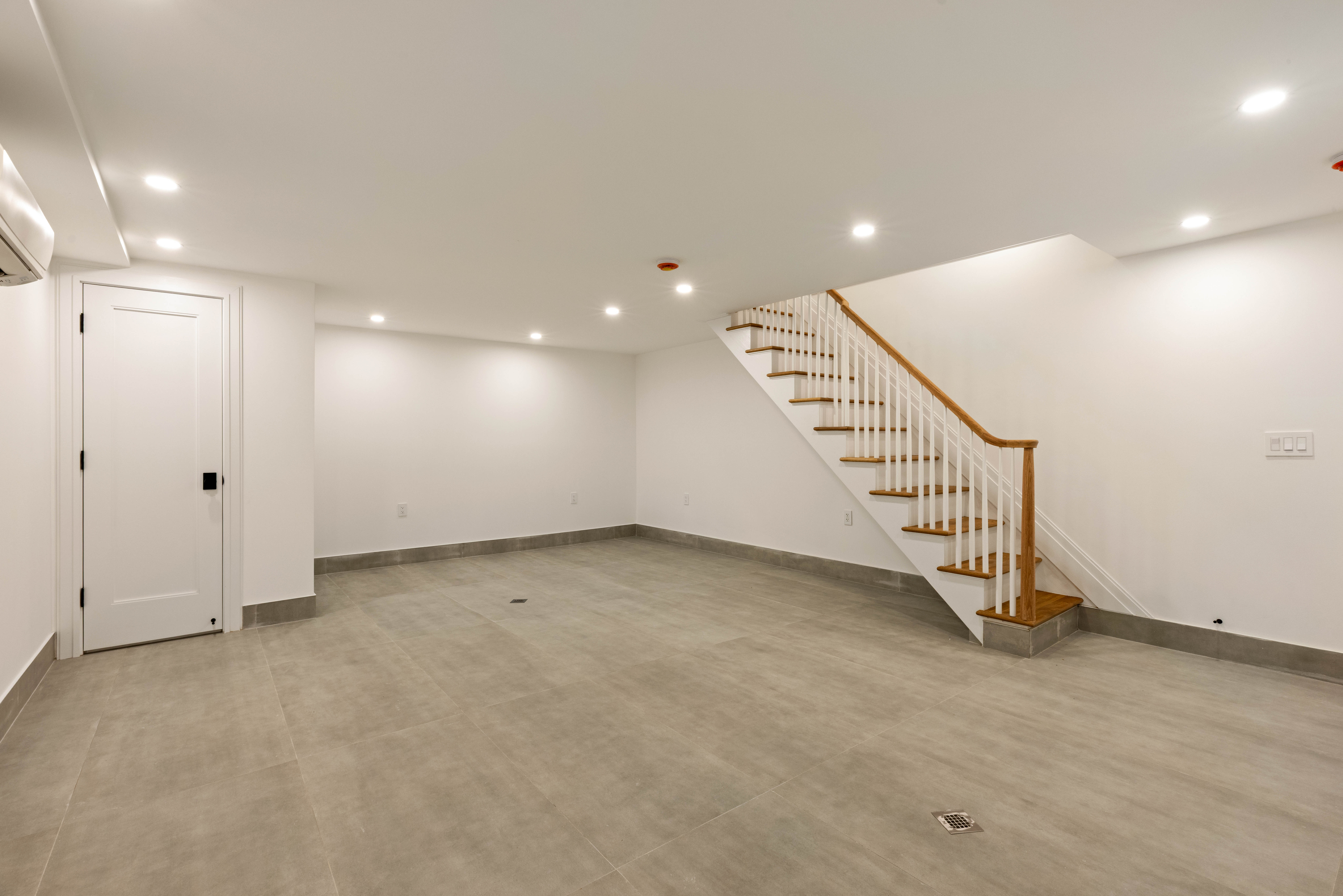 173 8th Street Brooklyn, NY 11215 - Photo 12 of 17 a view of an empty room with staircase