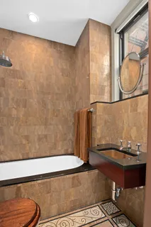 a room with table and a mirror