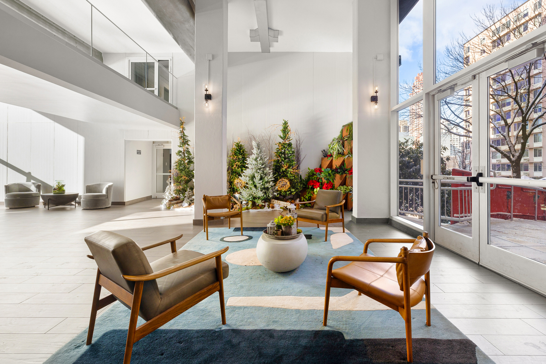 555 Main Street, Unit 1002 Manhattan, NY 10044 - Photo 10 of 12 a view of a patio with dining table and chairs