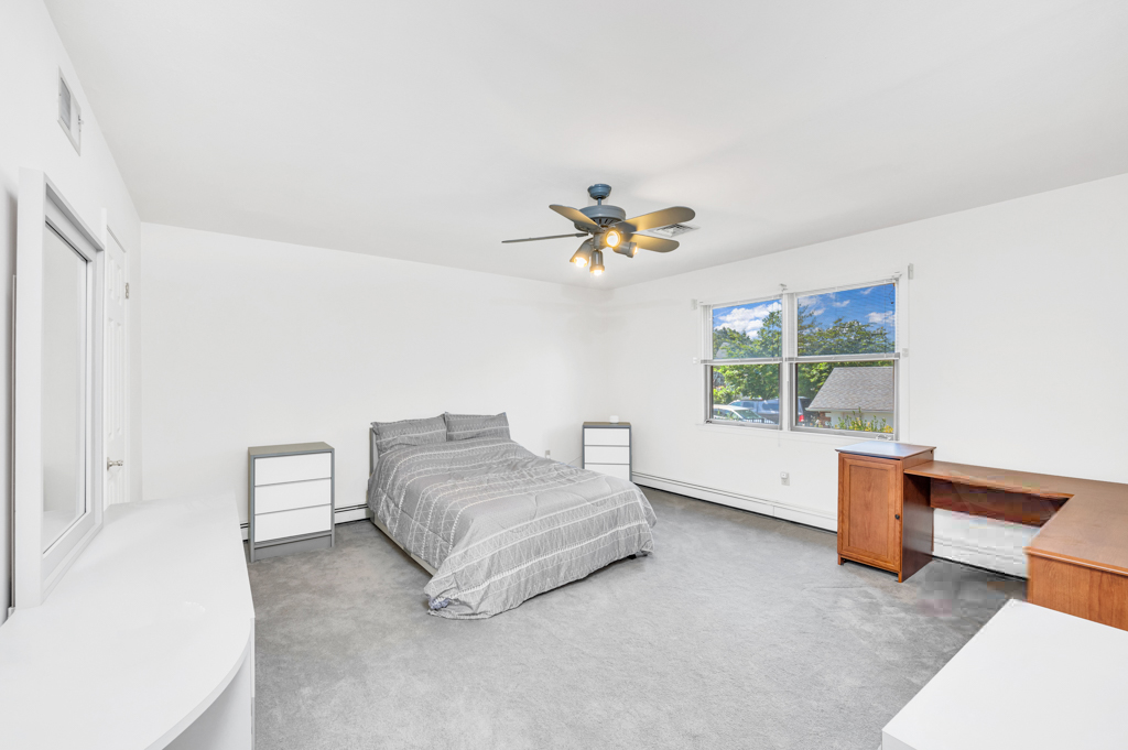 35 Poe Street Staten Island, NY 10307 - Photo 19 of 36 a living room with furniture and a window
