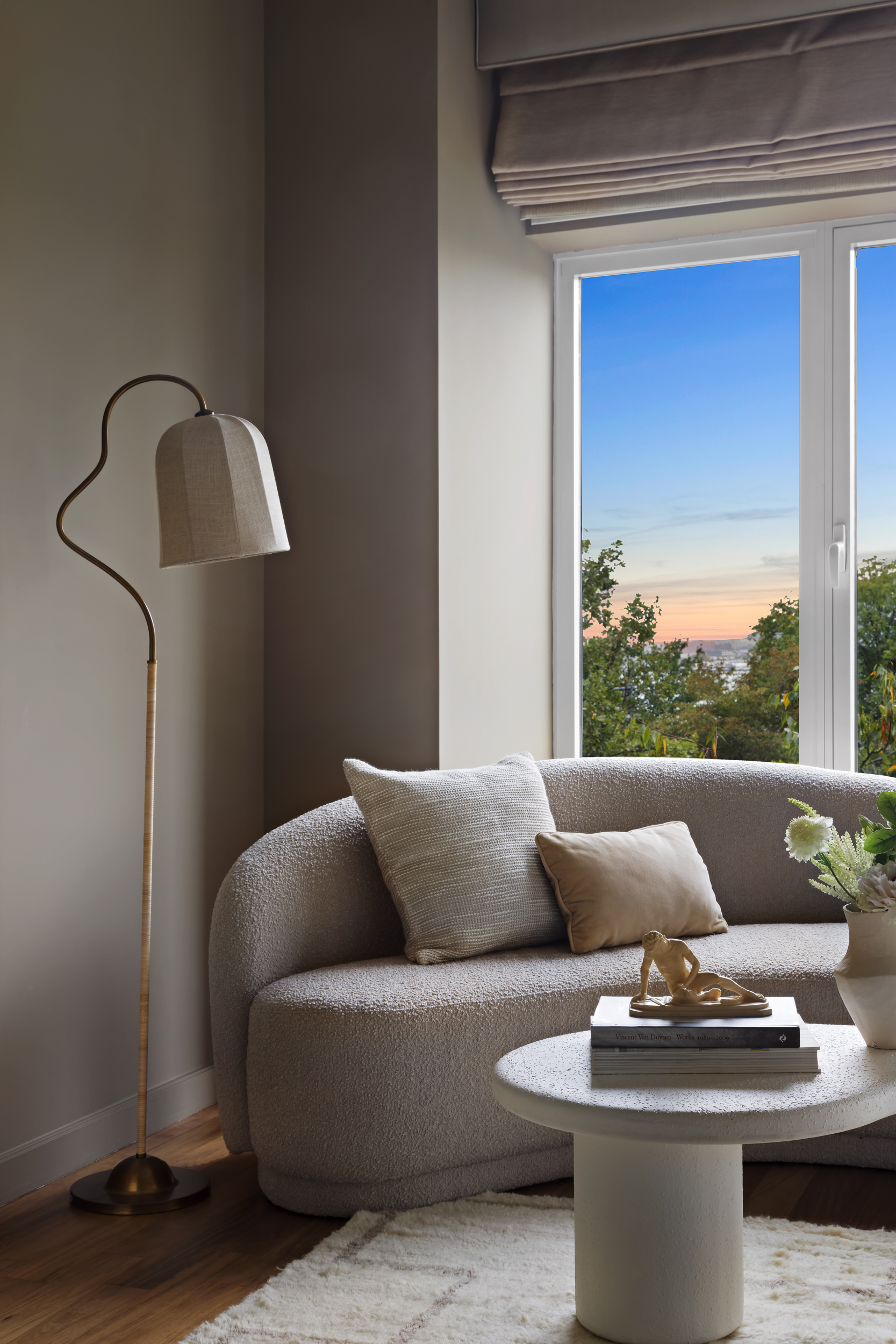 400 West 12th Street, Unit 4E Manhattan, NY 10014 - Photo 14 of 24 a living room with furniture and a window