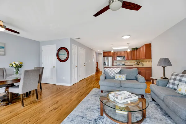 a living room with furniture and a table