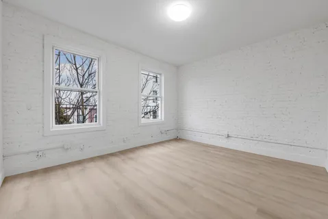 an empty room with windows