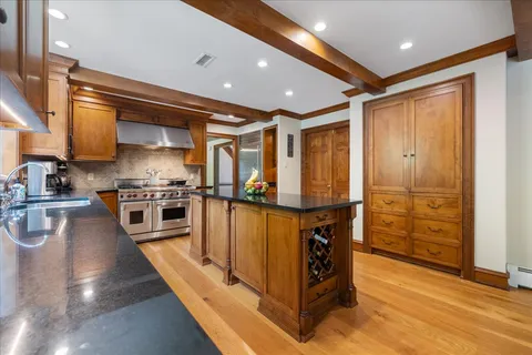 a living room with furniture window and wooden floor