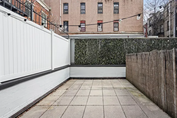 a view of a house with a large window