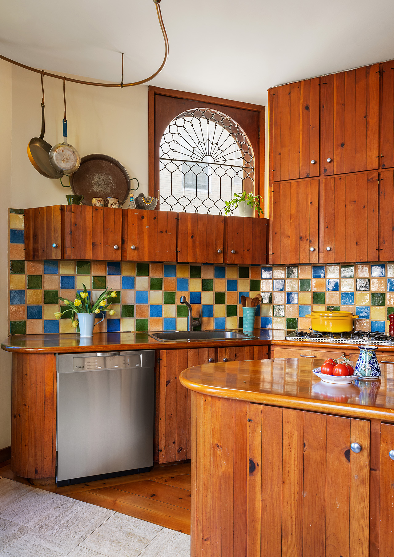 323 Garfield Place Brooklyn, NY 11215 - Photo 5 of 14 a kitchen with stainless steel appliances granite countertop a stove and a wooden cabinets
