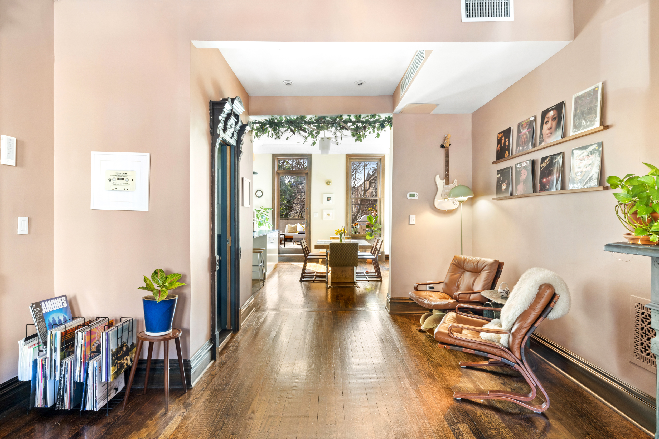 252 Stuyvesant Avenue Brooklyn, NY 11221 - Photo 3 of 26 a living room with furniture and wooden floor