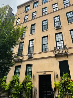 a front view of a multi story residential apartment building