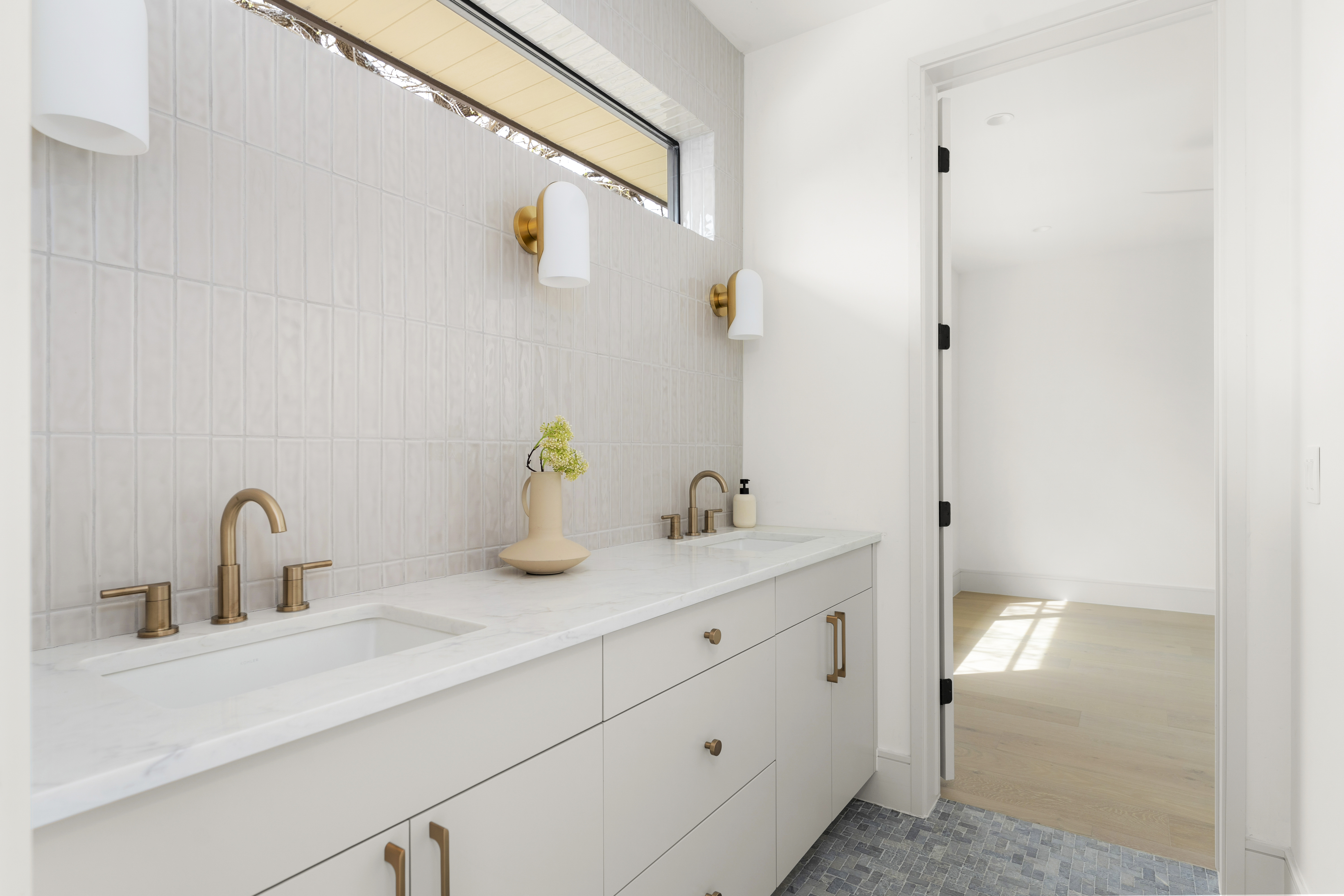 3411 Bridle Path Austin, TX 78703 - Photo 69 of 76 a bathroom with a sink and a mirror