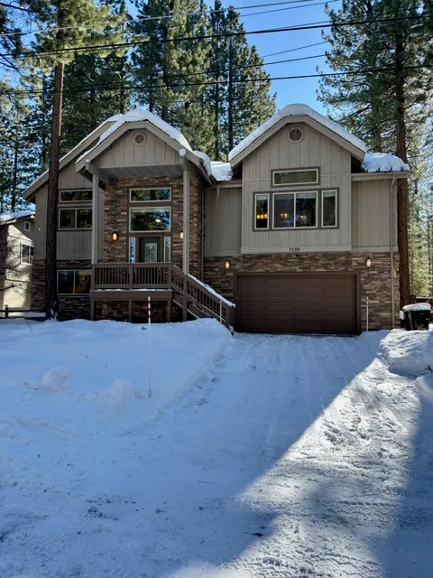 a front view of a house with parking