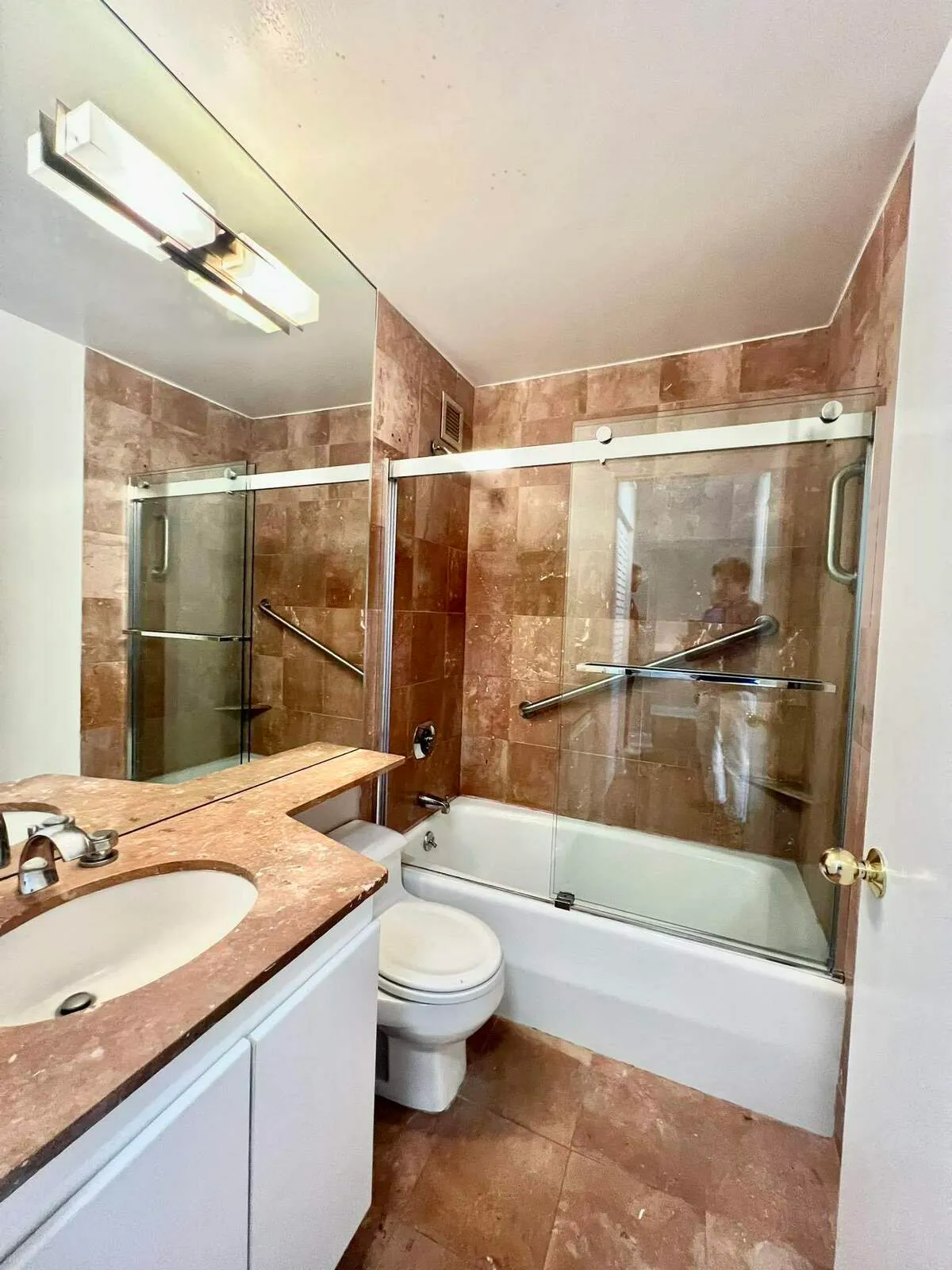 250 West 90th Street, Unit 6I Manhattan, NY 10024 - Photo 3 of 15 a bathroom with a granite countertop sink toilet and shower