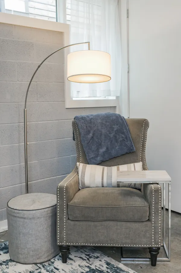 a living room with a couch and a table