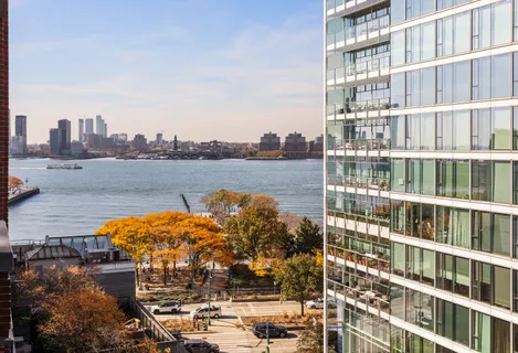 a view of a lake with building in front of it