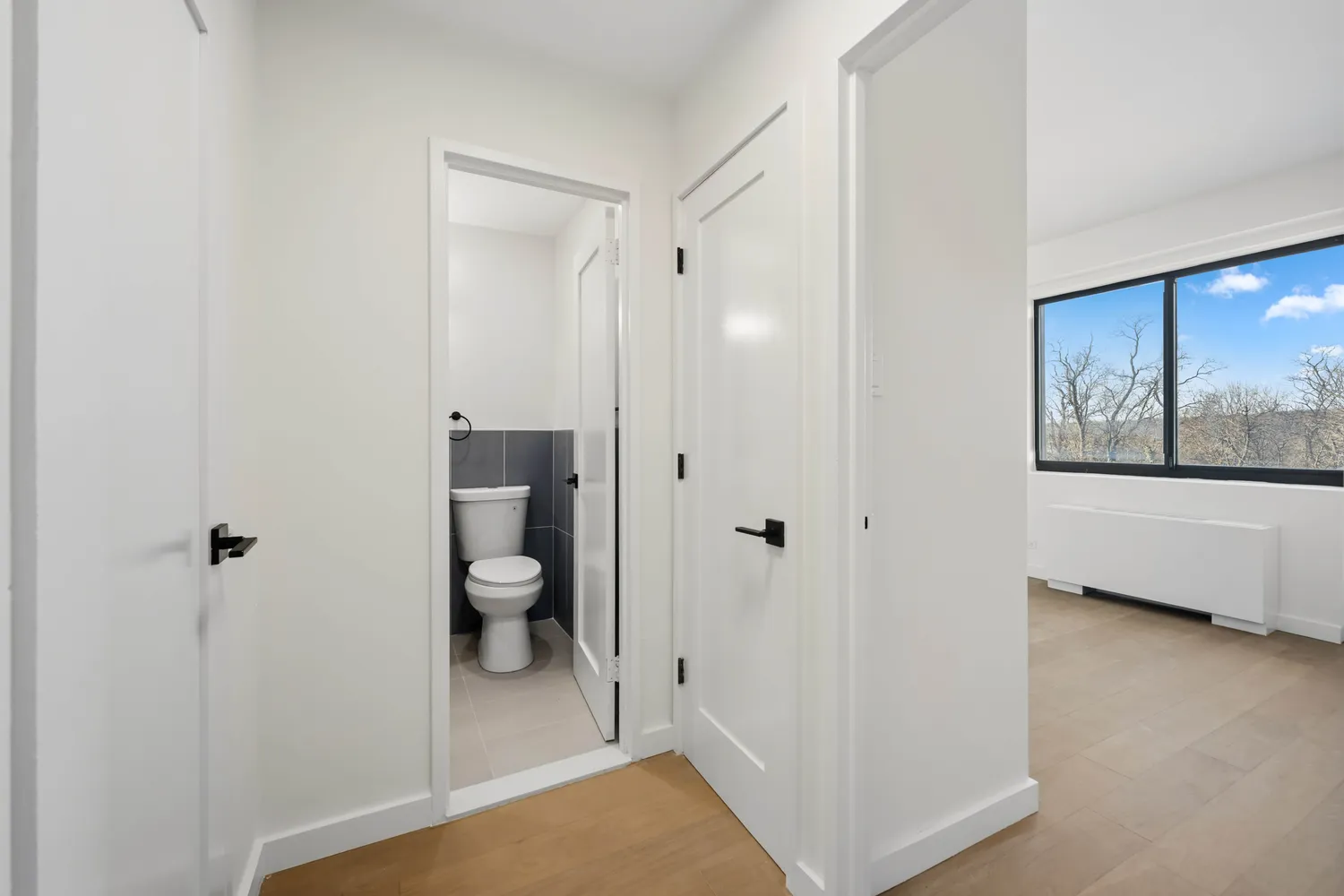 a bathroom with a sink a toilet and a bathtub