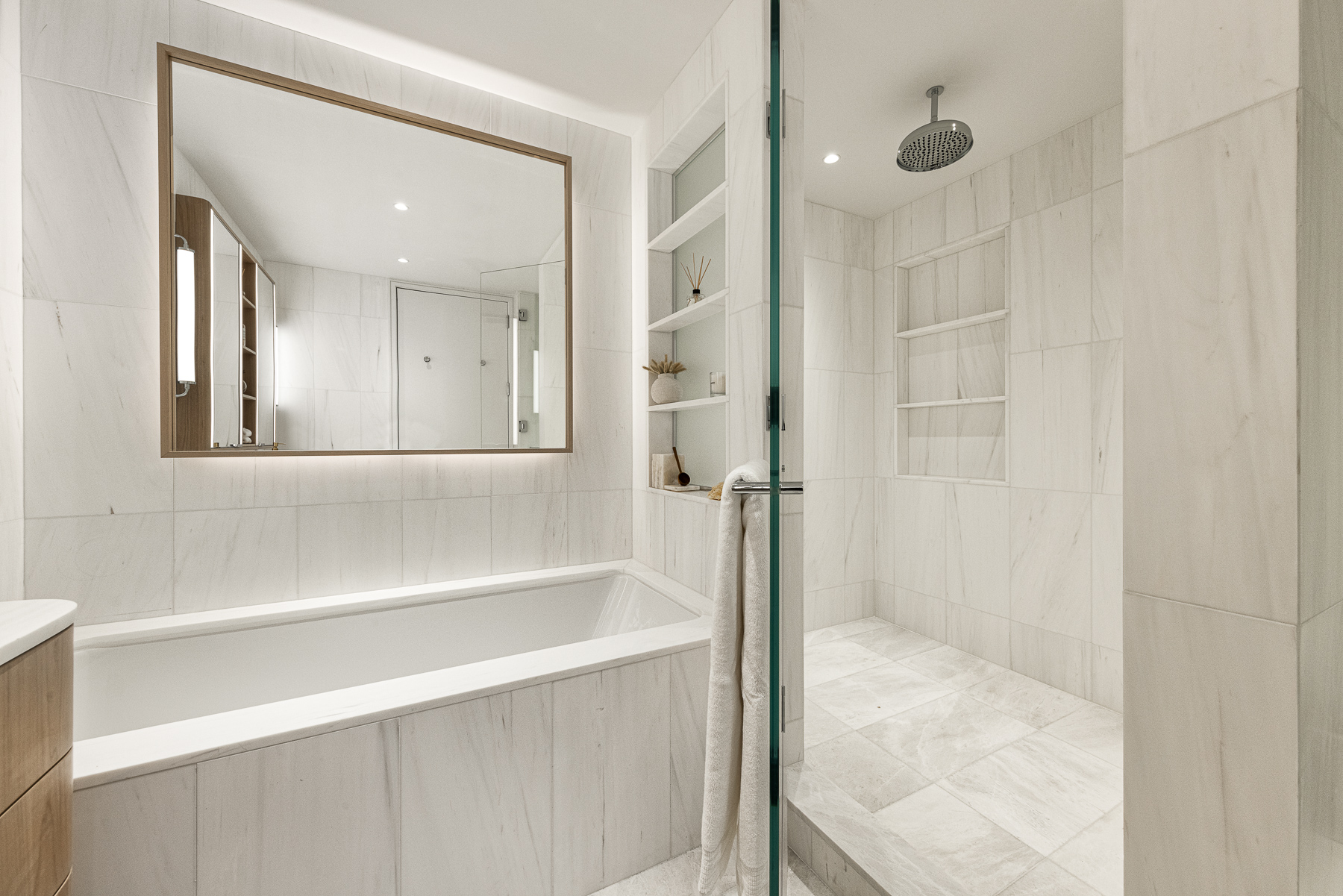 250 West 96th Street, Unit 10C Manhattan, NY 10025 - Photo 4 of 25 a bathroom with a bathtub and a shower