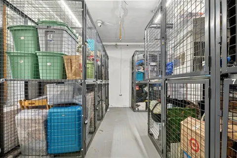a view of a large building with potted plants
