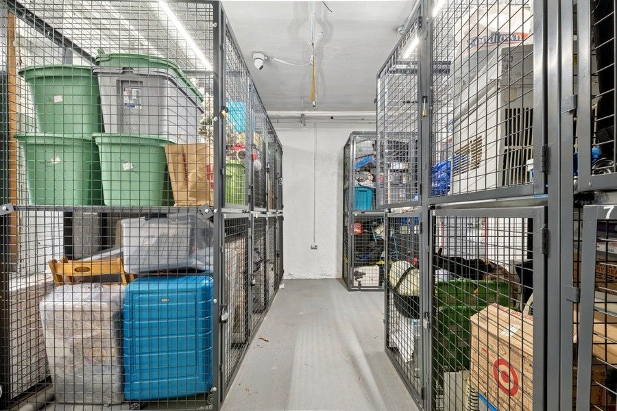 a view of a large building with potted plants