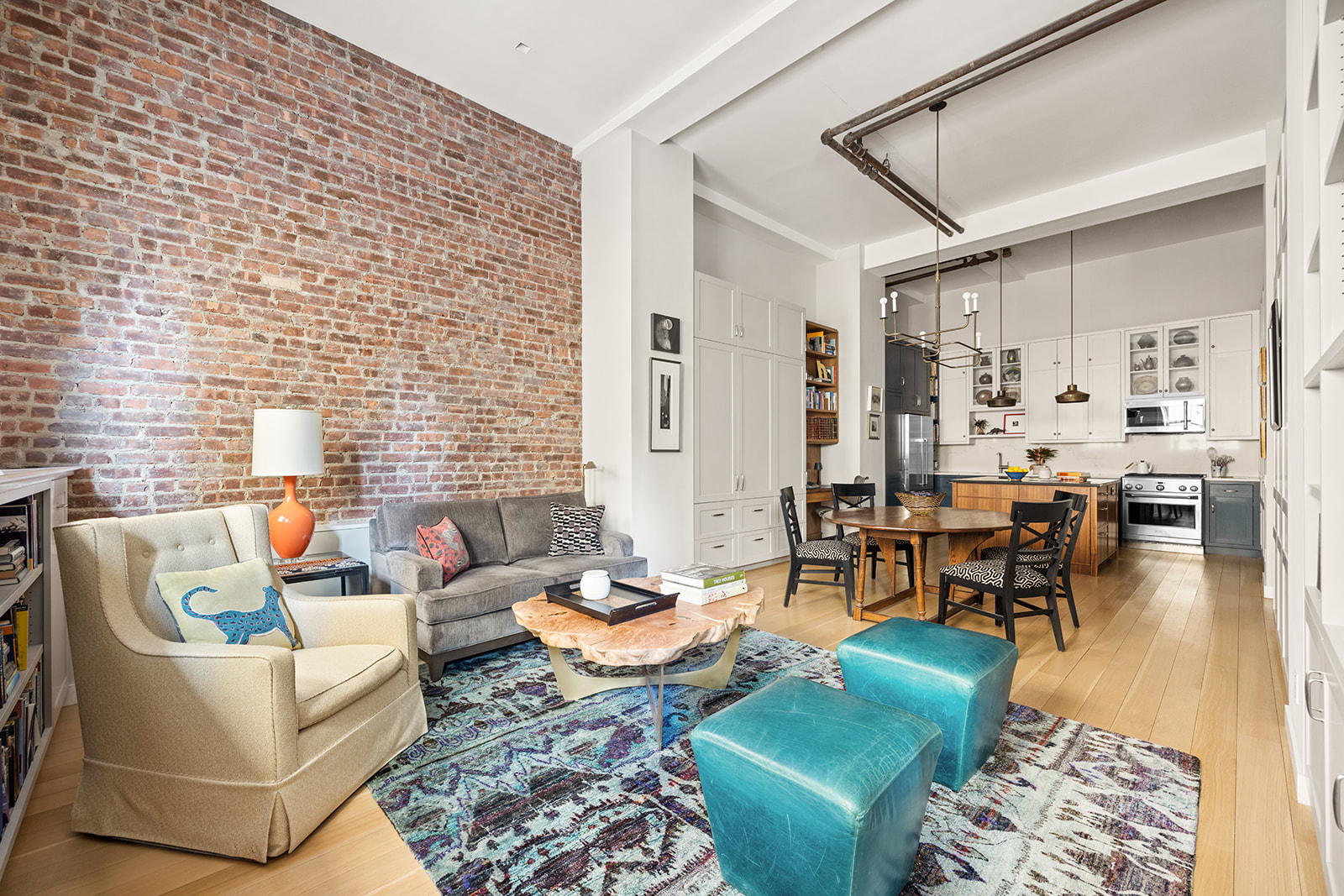 111 Hicks Street, Unit 4A Brooklyn, NY 11201 - Photo 3 of 11 a living room with furniture wooden floor and a table