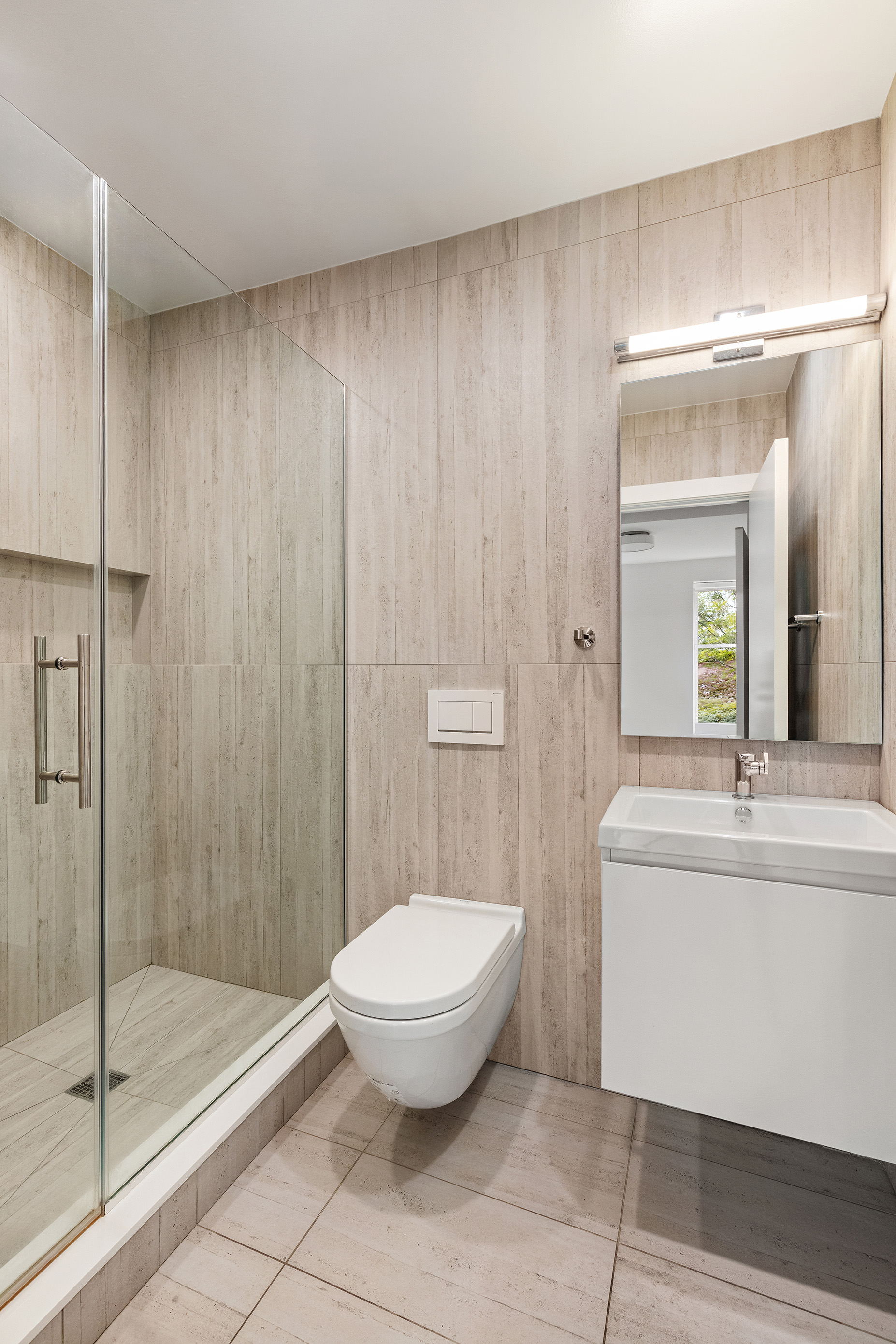 494 7th Street, Unit 3 Brooklyn, NY 11215 - Photo 8 of 9 a bathroom with a toilet a sink and shower