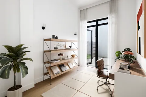 a living room with furniture potted plant and a large window