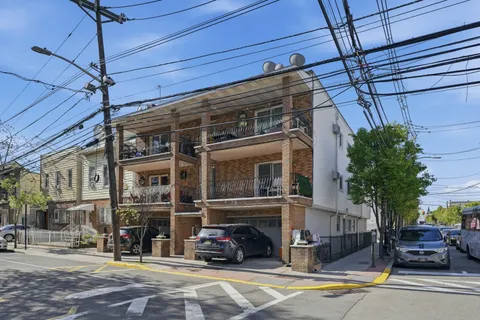 a view of a street with cars