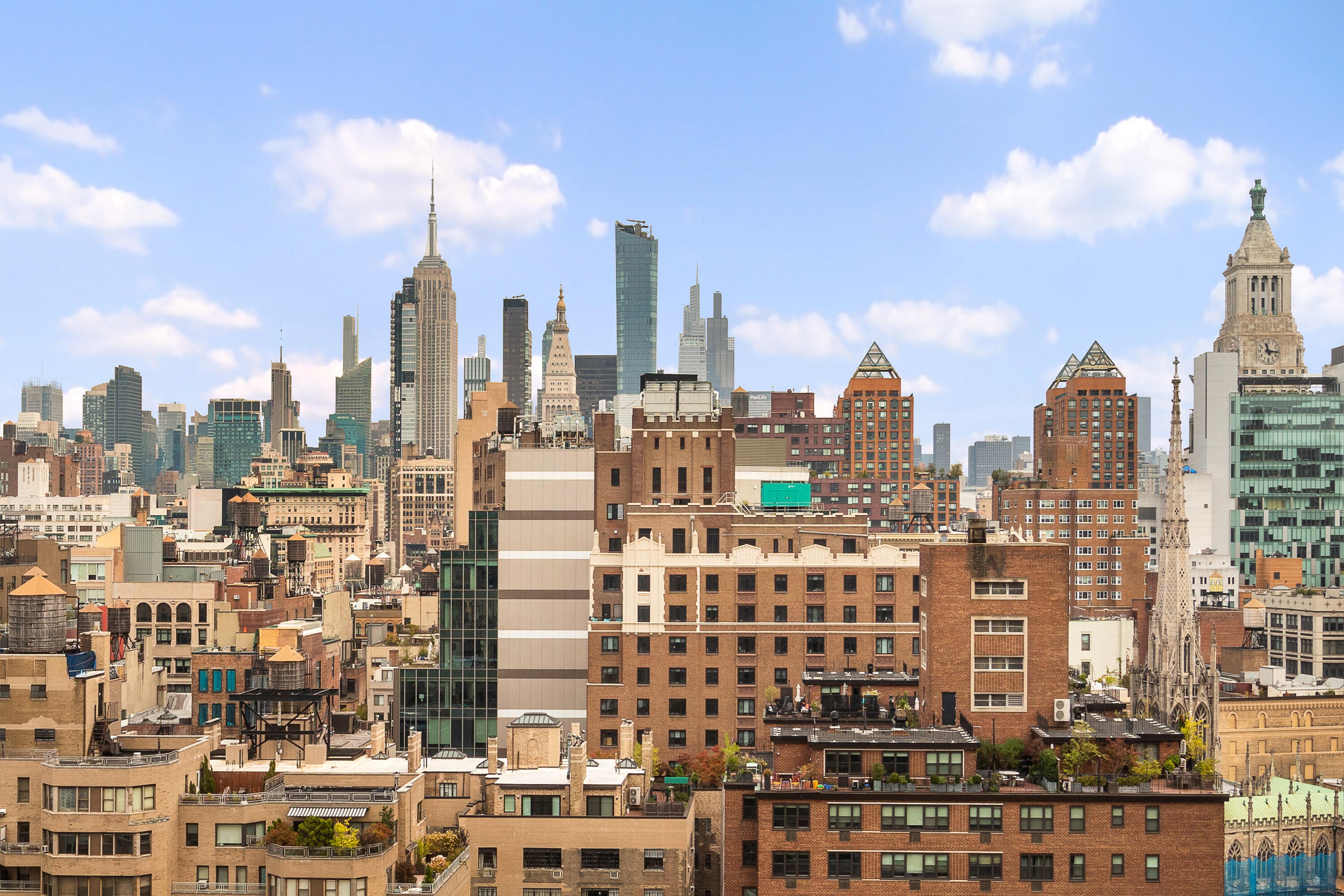60 East 8th Street, Unit 18J Manhattan, NY 10003 - Photo 8 of 10 a view of a city with tall buildings