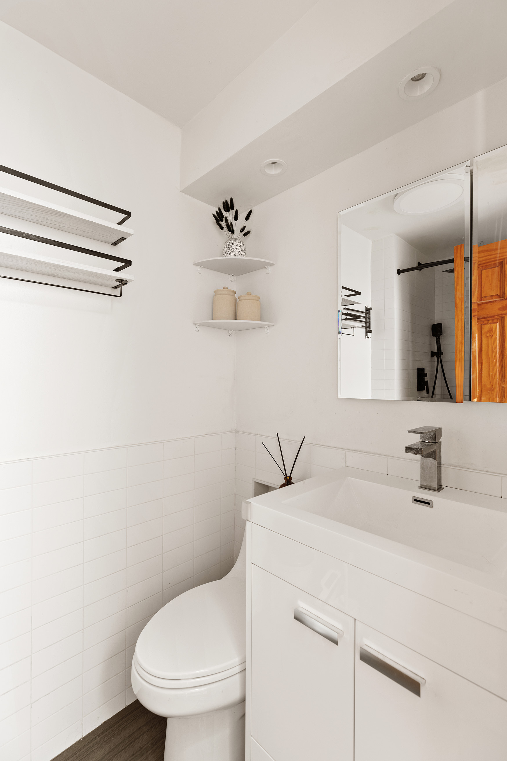 171 Monitor Street Brooklyn, NY 11222 - Photo 8 of 11 a bathroom with a toilet sink and shower