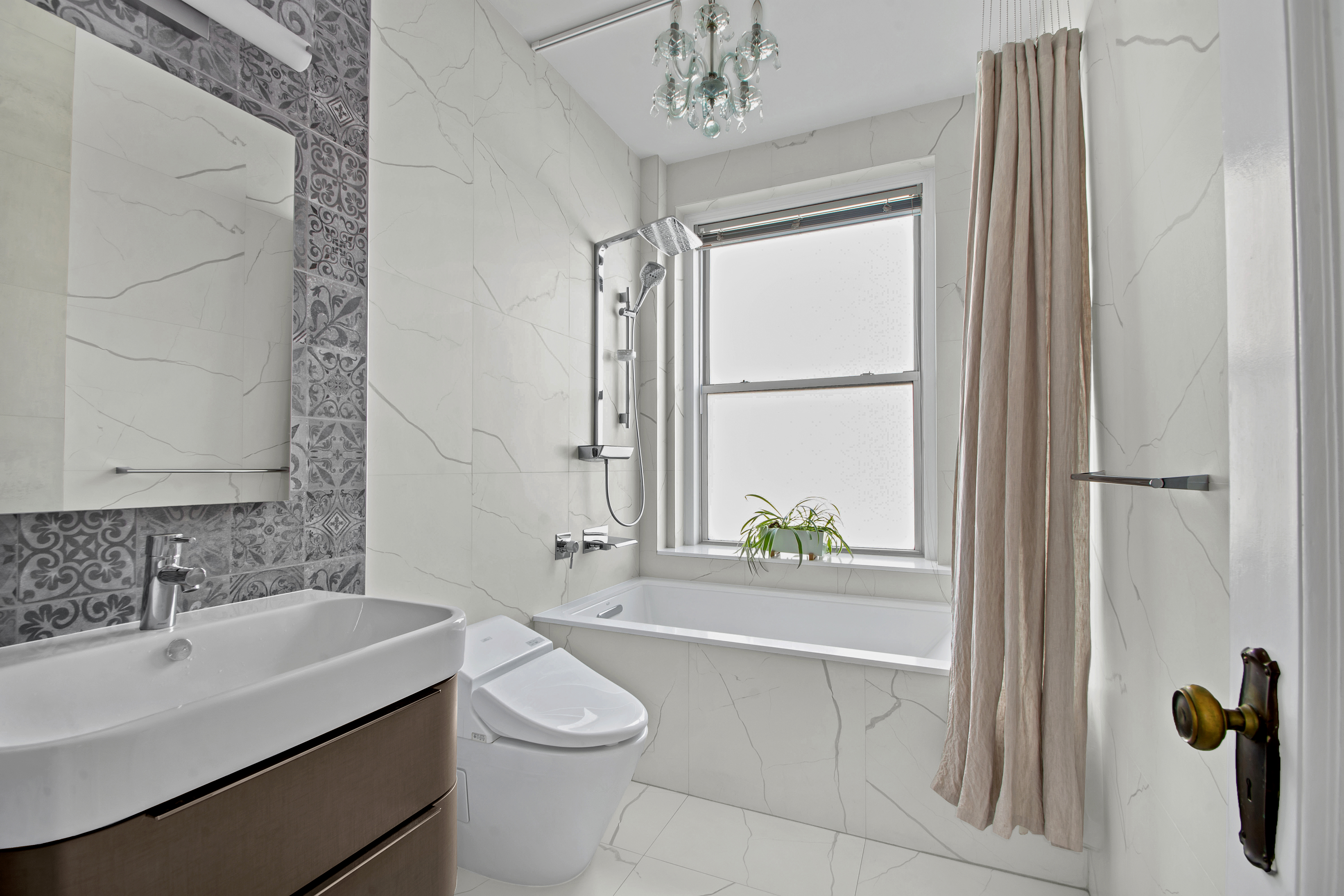 800 Riverside Drive, Unit 2E Manhattan, NY 10032 - Photo 18 of 27 a bathroom with a sink toilet and shower