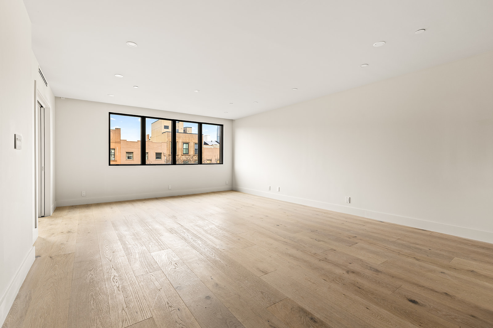 78 1st Place, Unit 5 Brooklyn, NY 11231 - Photo 4 of 24 an empty room with wooden floor and windows