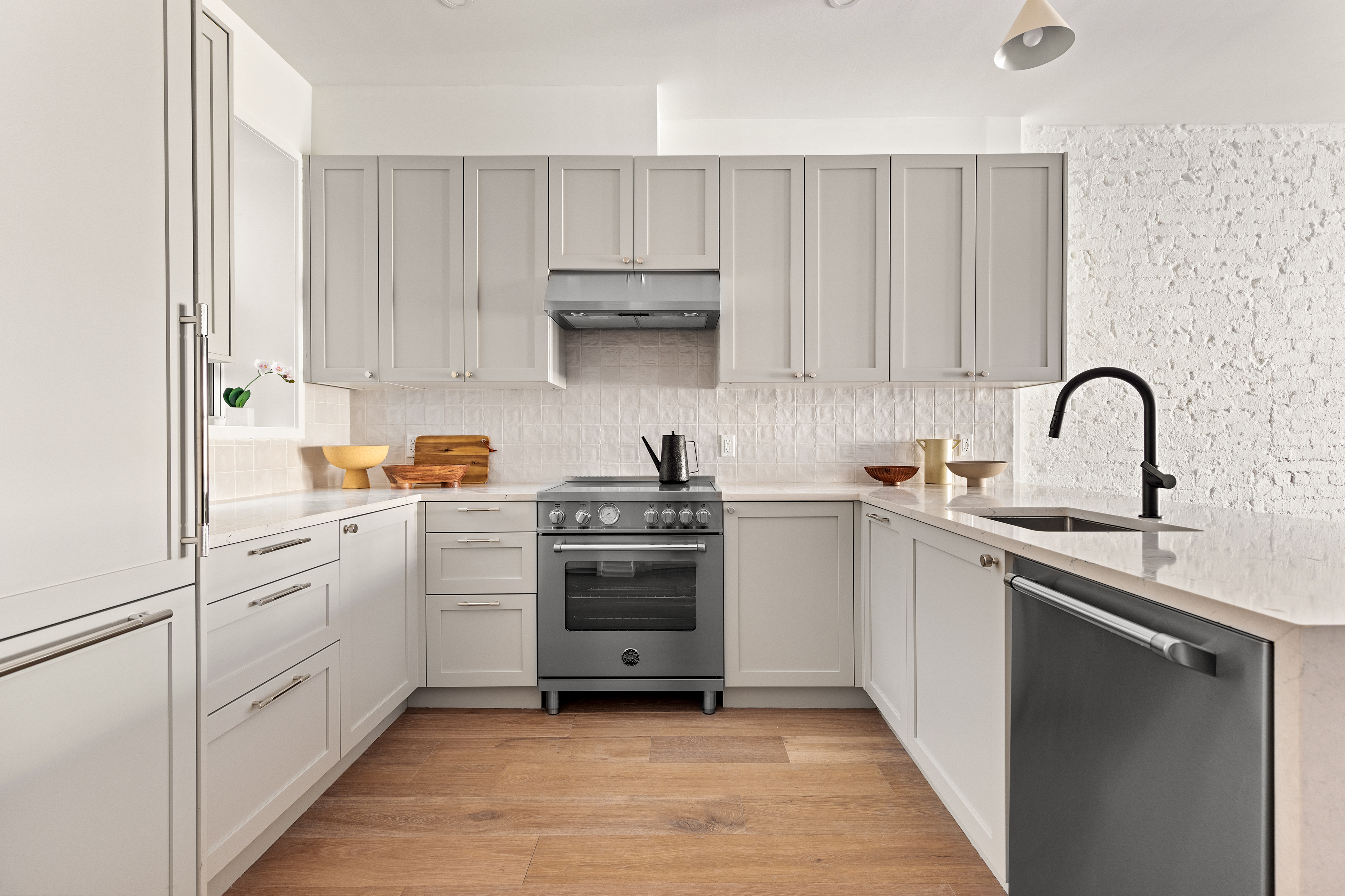 744 Park Place, Unit 2A Brooklyn, NY 11216 - Photo 3 of 11 a kitchen with cabinets appliances and a sink