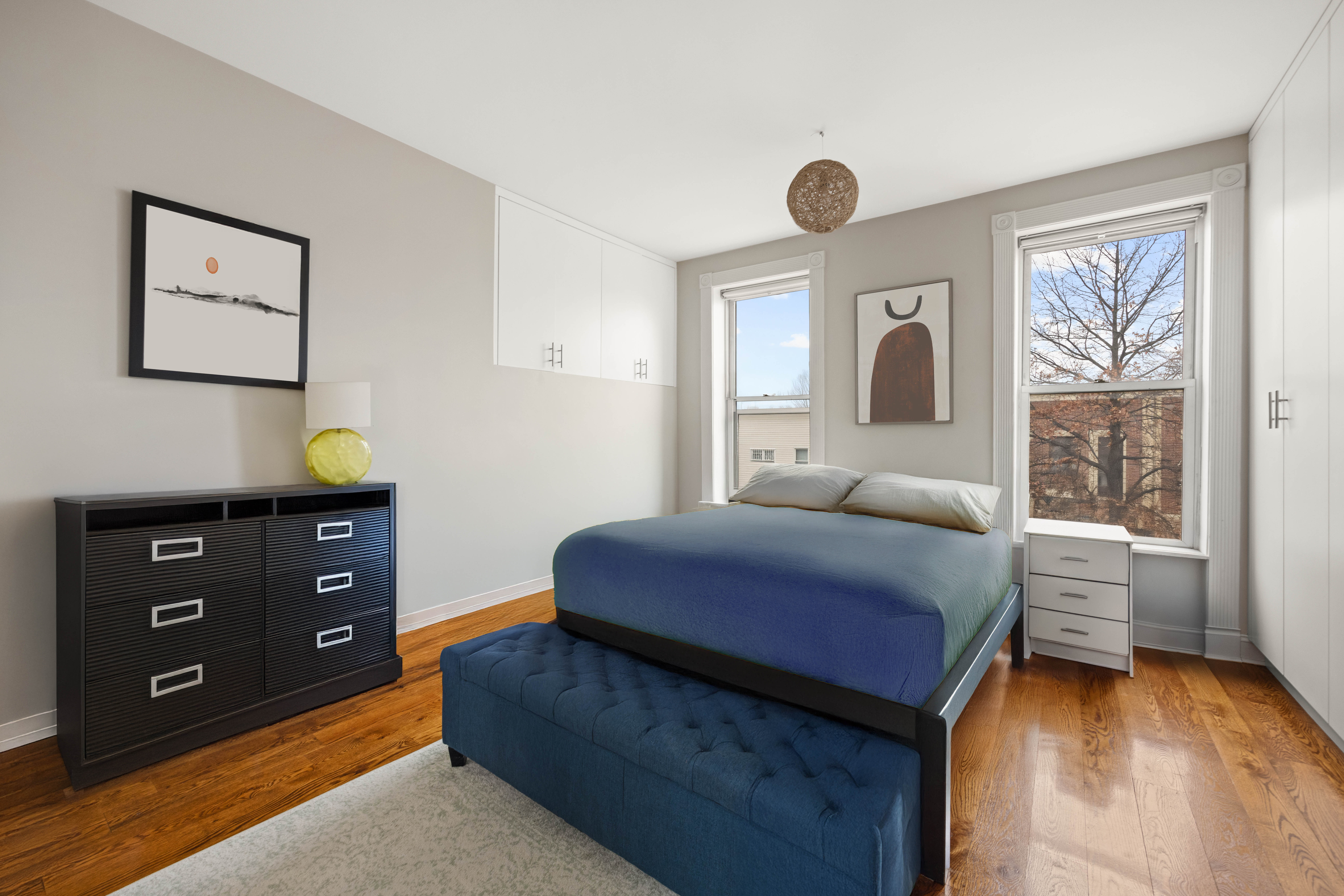11A Dewey Place Brooklyn, NY 11233 - Photo 4 of 12 a bedroom with a bed and a dresser