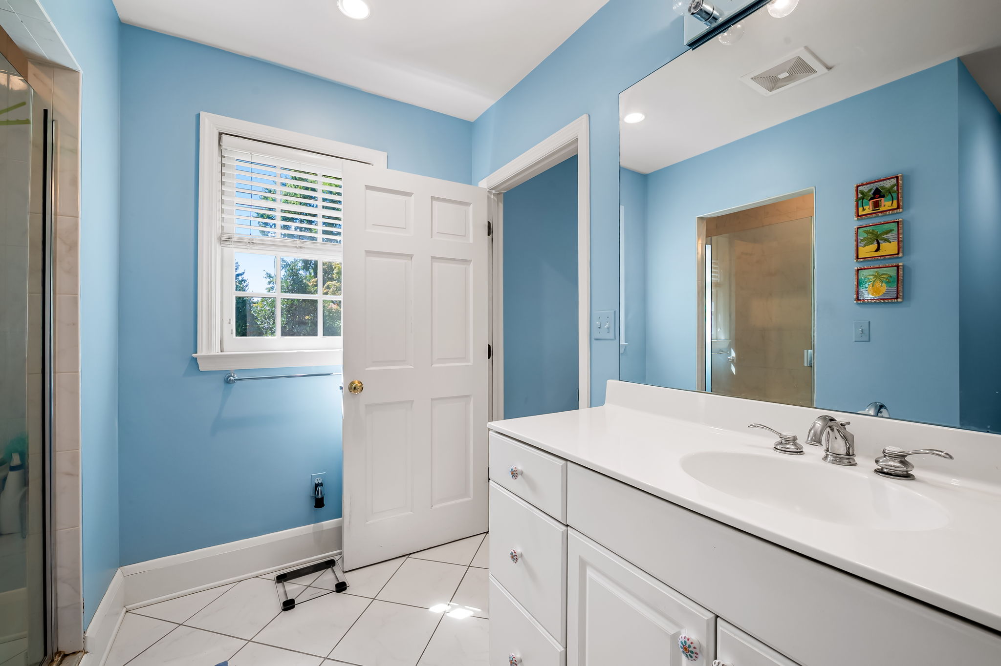 910 Army Road Towson, MD 21204 - Photo 27 of 62 a bathroom with a sink and a mirror