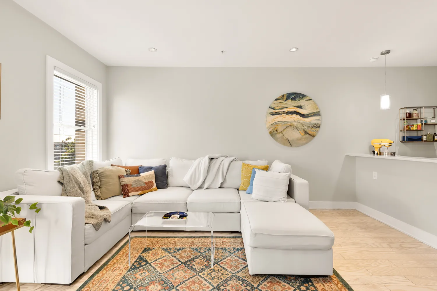 a living room with furniture and window