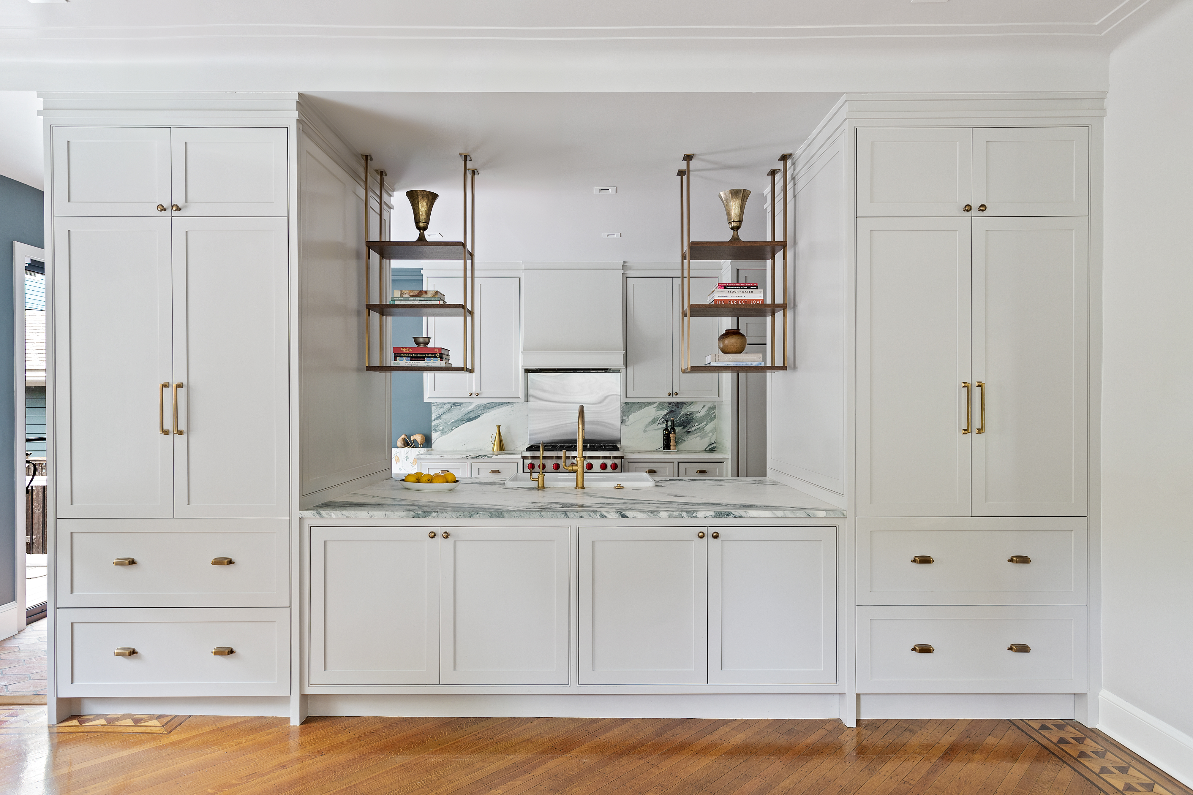 498 Westminster Road Brooklyn, NY 11218 - Photo 7 of 32 a kitchen with white cabinets and sink