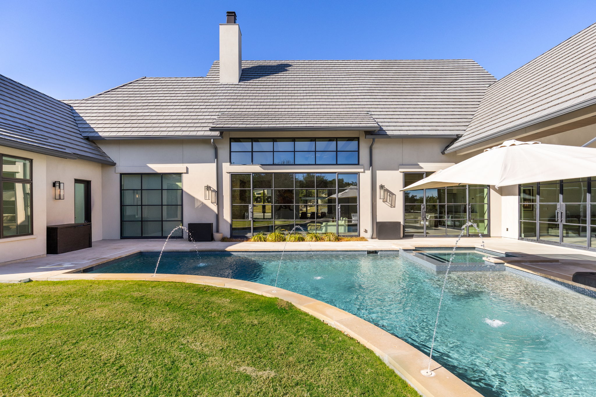 522 Delayne Drive Austin, TX 78737 - Photo 14 of 23 a view of an house with swimming pool and porch