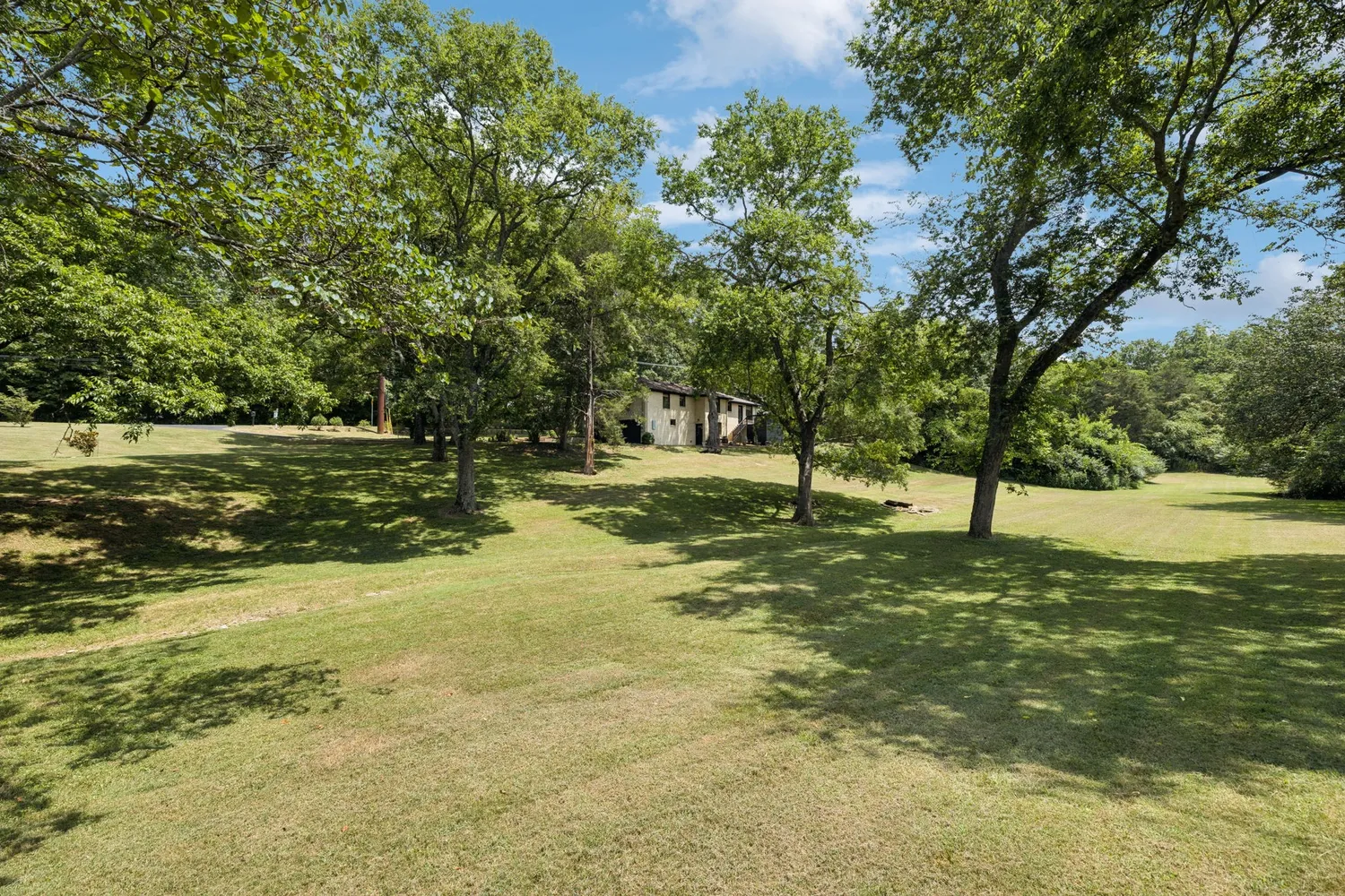 a view of a lake with a house