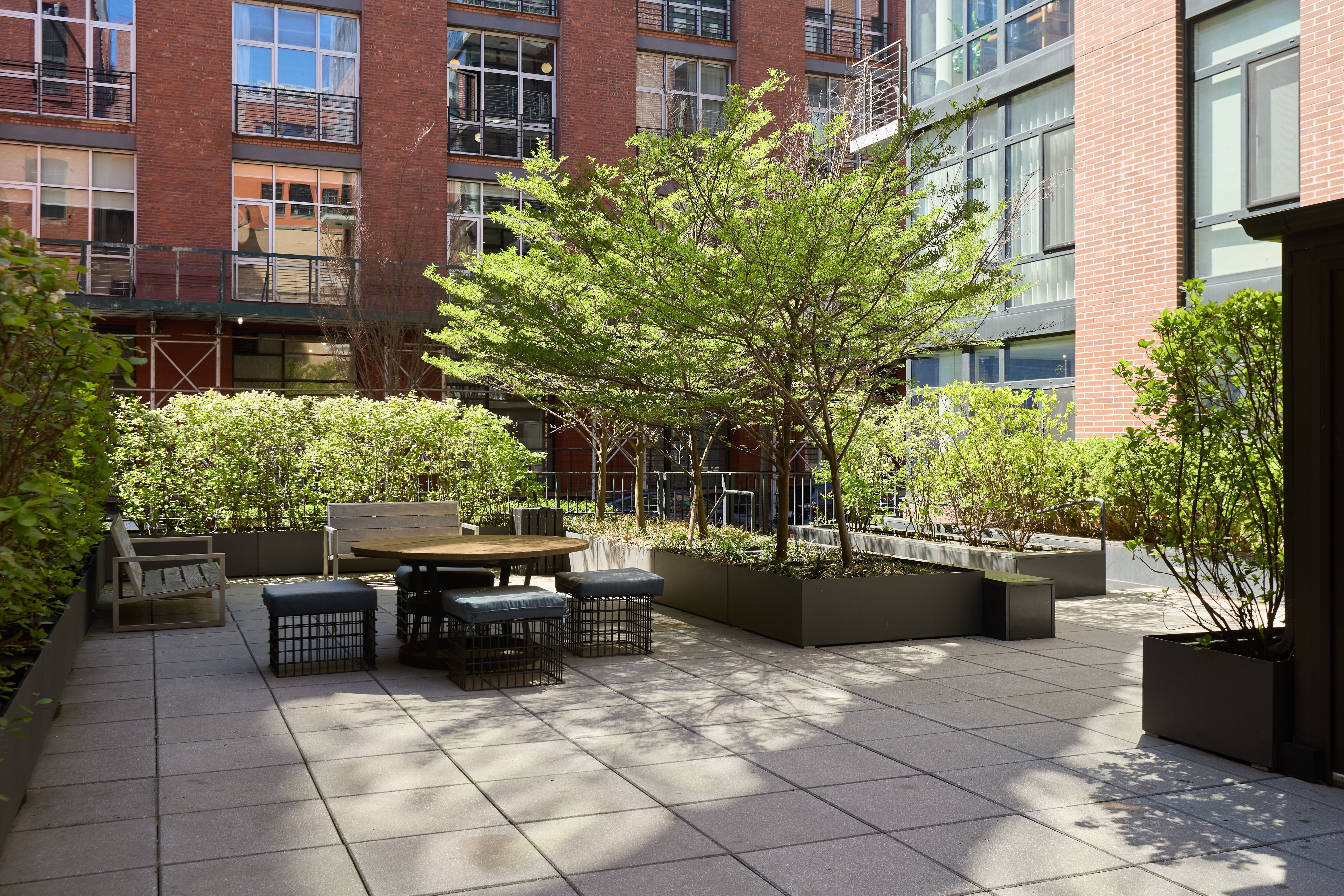 47 Bridge Street, Unit 3DD Brooklyn, NY 11201 - Photo 17 of 24 a view of a patio with couches and potted plants