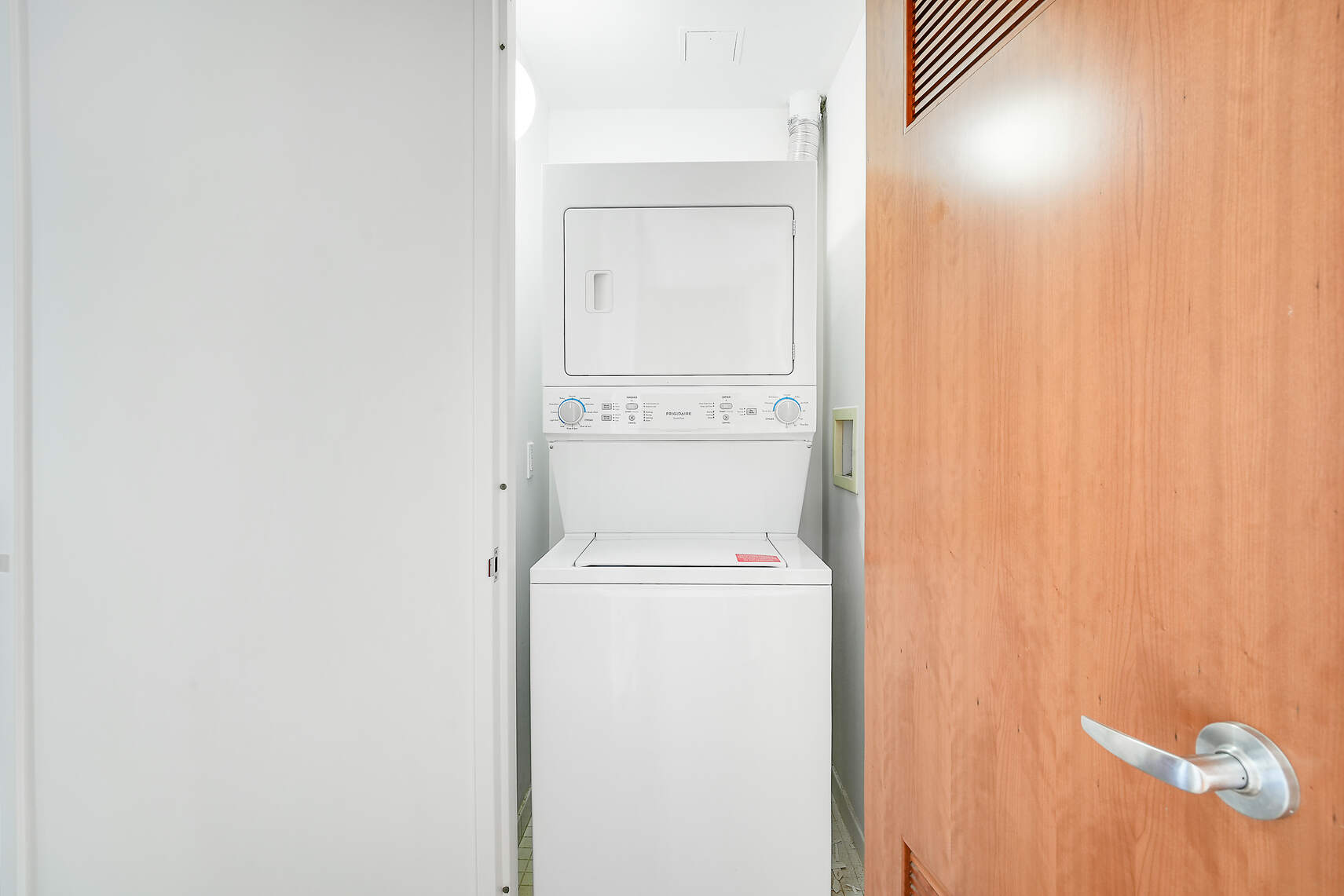 454 West 54th Street, Unit 3A Manhattan, NY 10019 - Photo 7 of 13 a utility room with dryer and washer