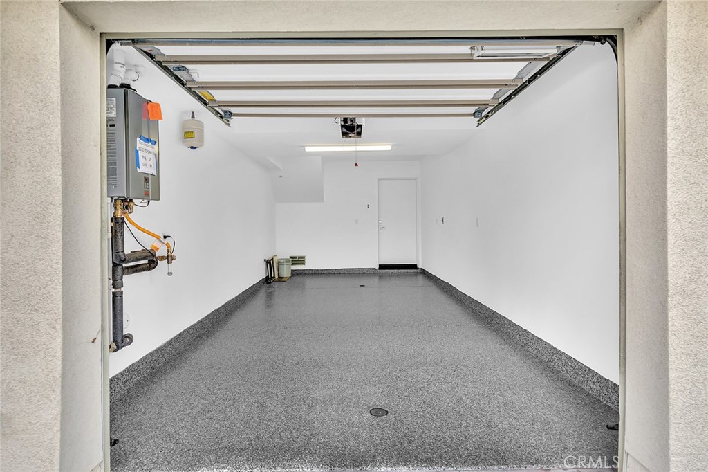 1632 Doheny Way Dana Point, CA 92629 - Photo 23 of 33 a view of a hallway with closet and chandelier