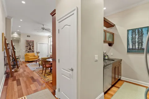 a view of a living room and bathroom