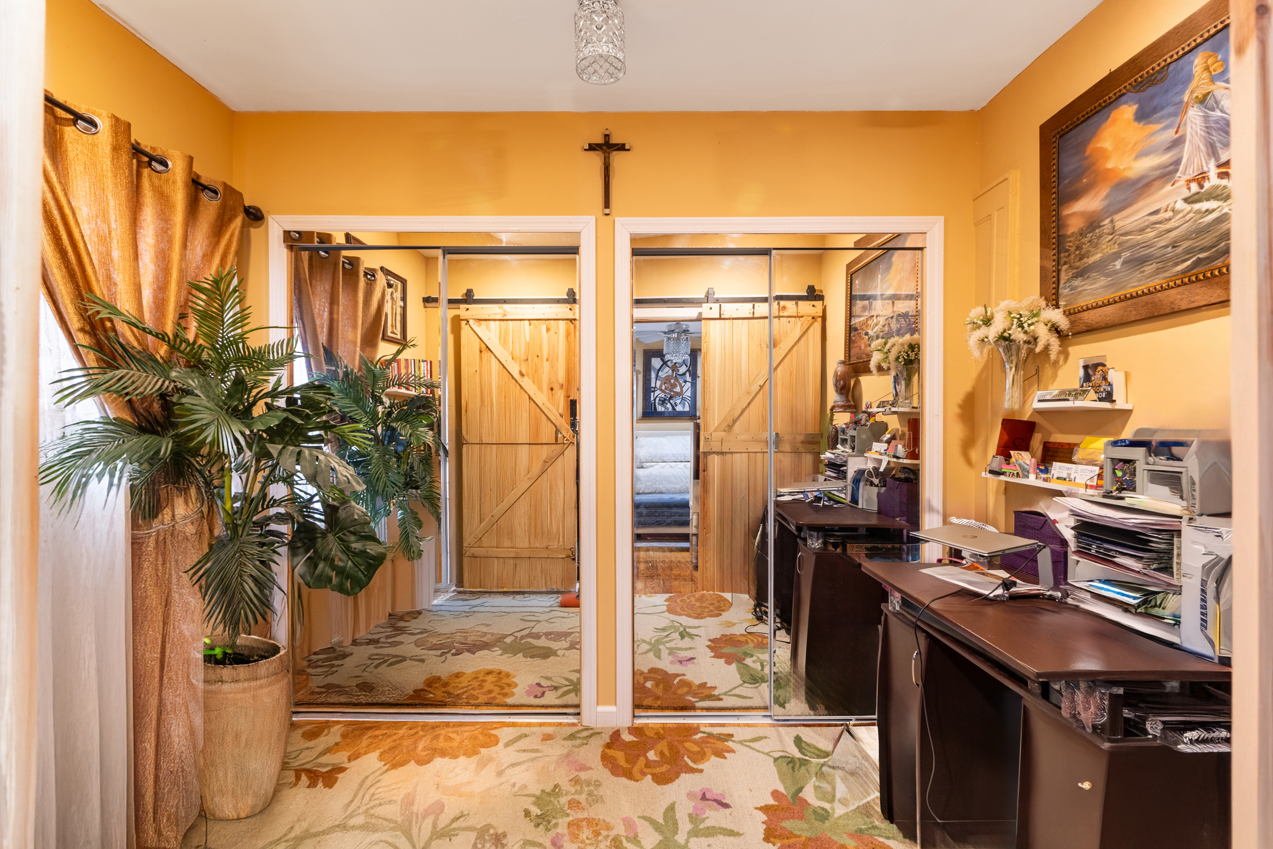 961 East 32nd Street Brooklyn, NY 11210 - Photo 17 of 24 a kitchen with stainless steel appliances a stove and a refrigerator