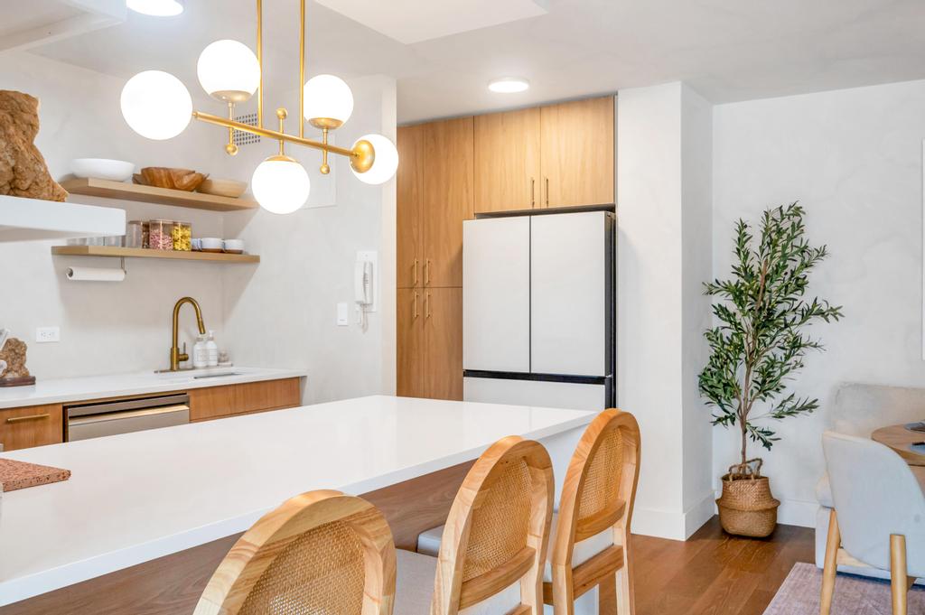 175 West 12th Street, Unit 5E Manhattan, NY 10011 - Photo 7 of 22 a spacious bathroom with a potted plant and a sink