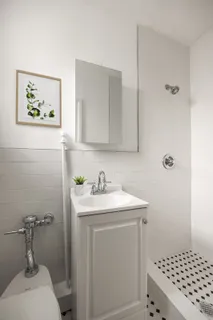 a bathroom with a sink toilet and vanity