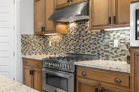 a bedroom with a bed and with furniture