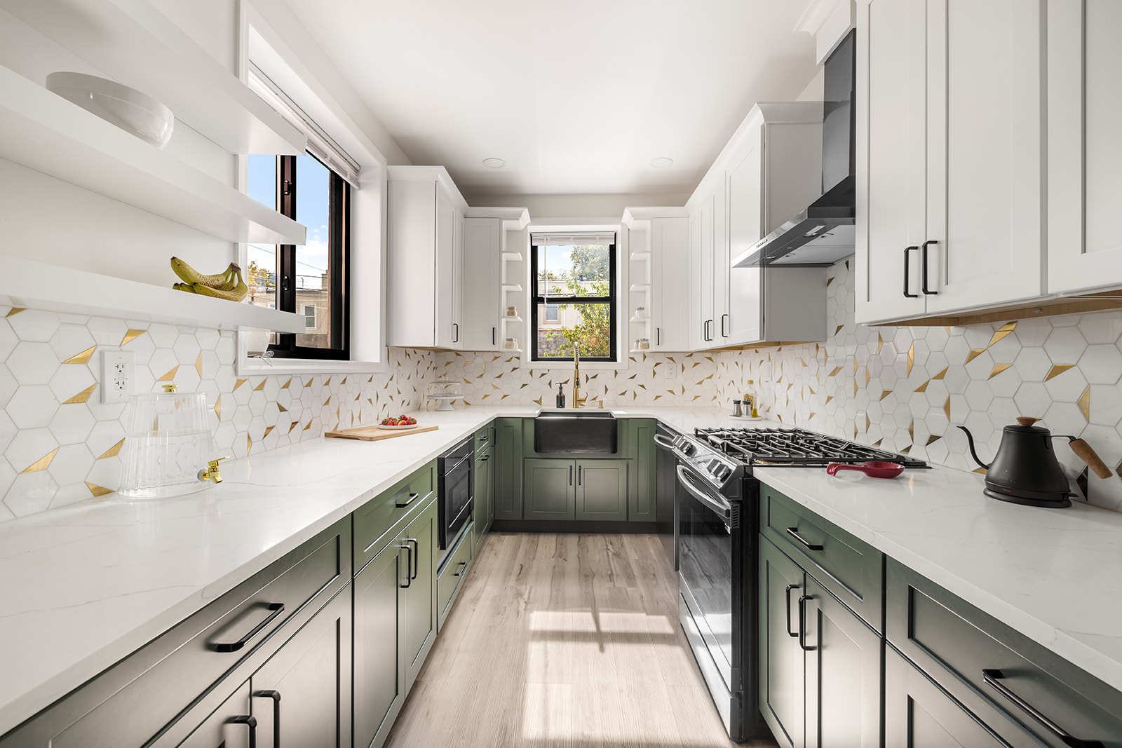 466 81st Street Brooklyn, NY 11209 - Photo 4 of 15 a kitchen with a sink stove and cabinets