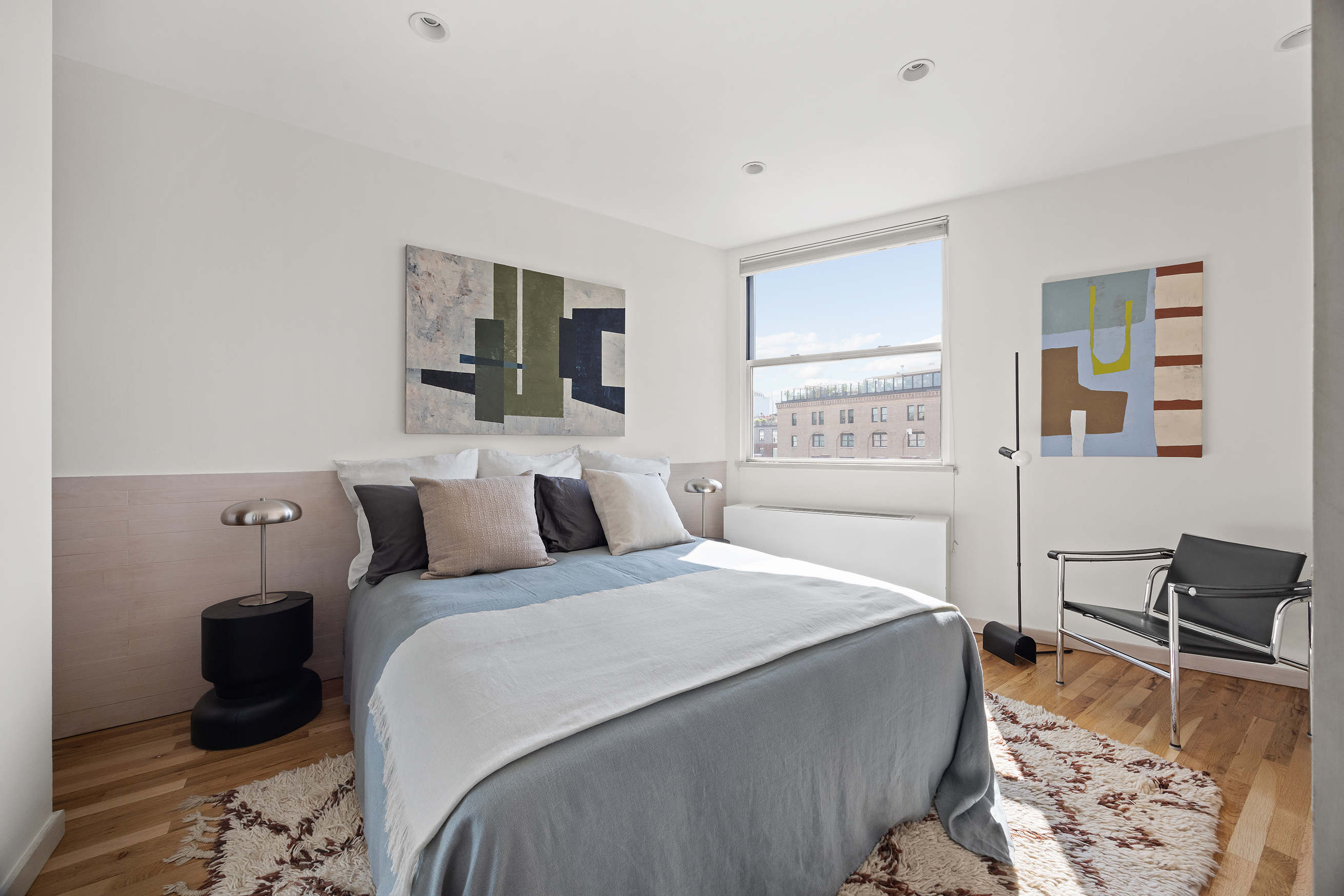 350 West 14th Street, Unit 6D Manhattan, NY 10014 - Photo 9 of 16 a bedroom with bed and window