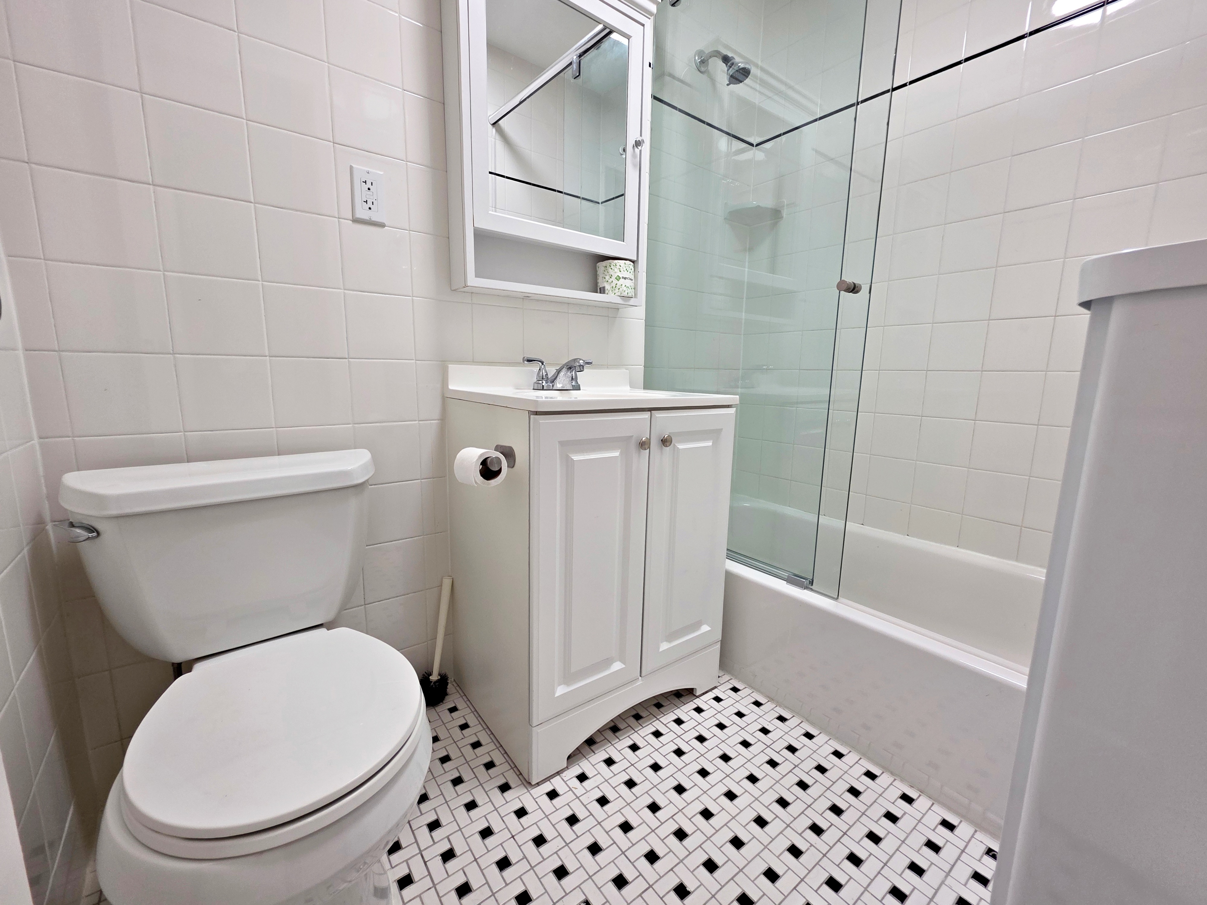 733 Metropolitan Avenue, Unit 3 Brooklyn, NY 11211 - Photo 12 of 13 a bathroom with a toilet and a shower