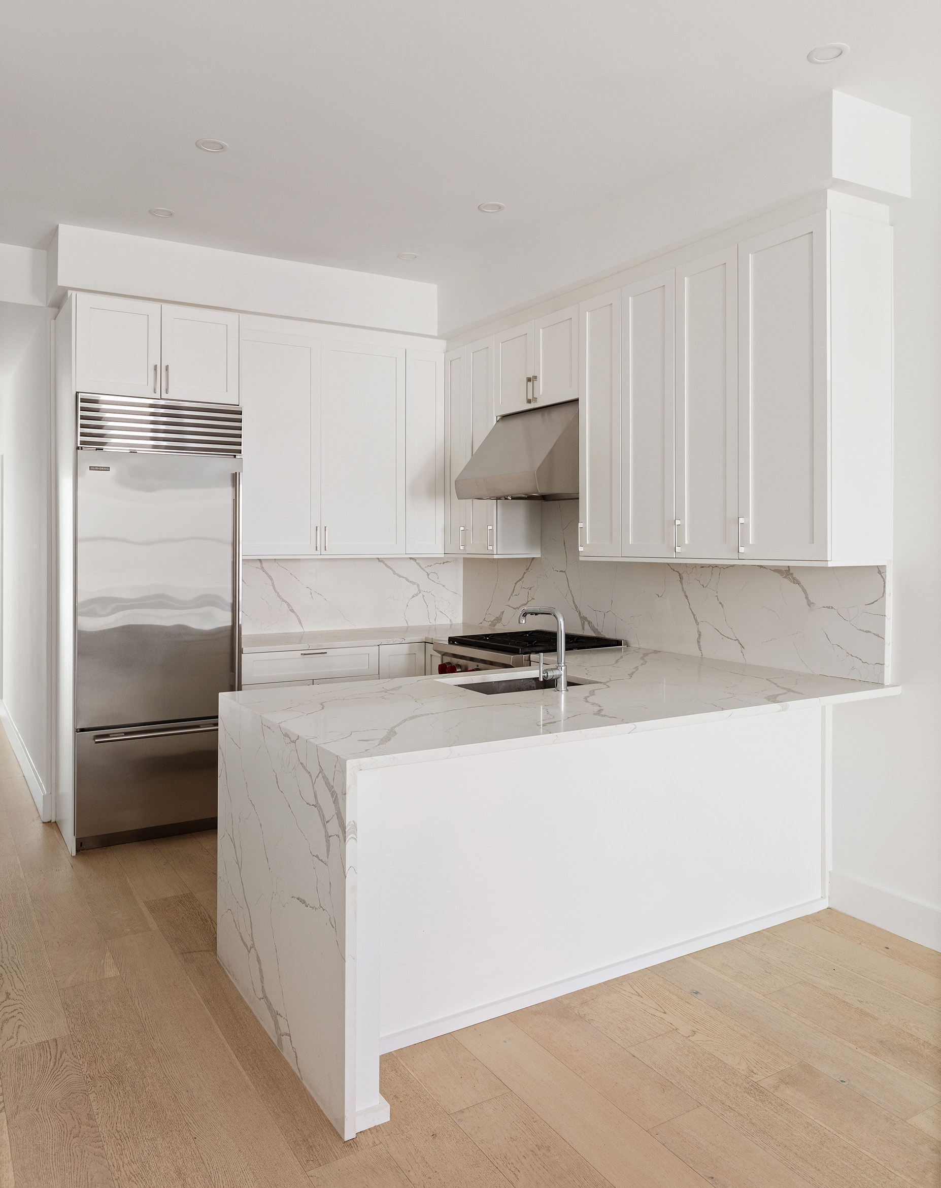 494 7th Street, Unit 3 Brooklyn, NY 11215 - Photo 2 of 9 a kitchen with stainless steel appliances granite countertop a sink and a stove