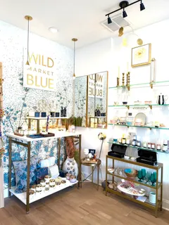 a living room with a table and chairs