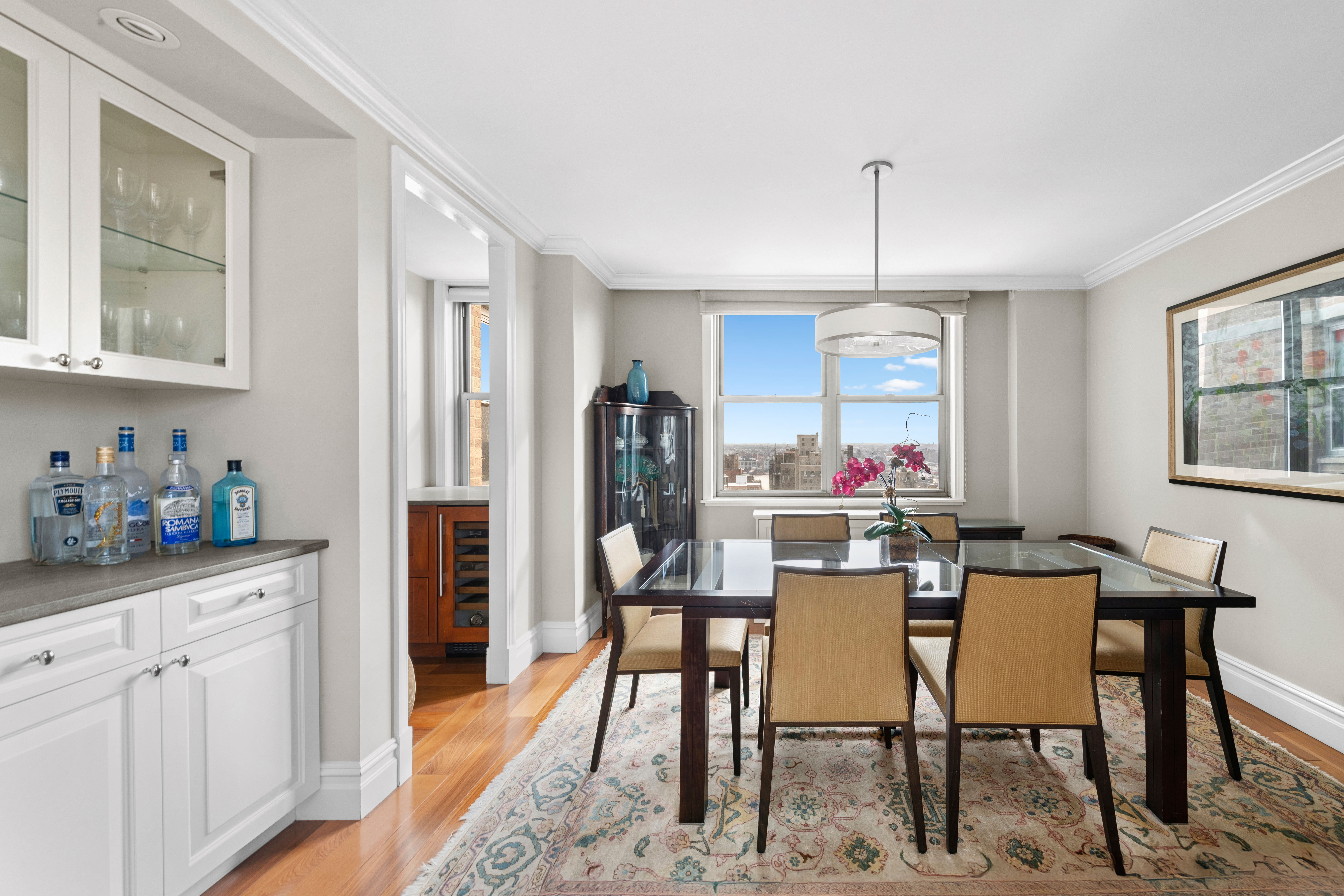 444 East 86th Street, Unit 25EF Manhattan, NY 10028 - Photo 3 of 18 a view of a dining room with furniture window and outside view